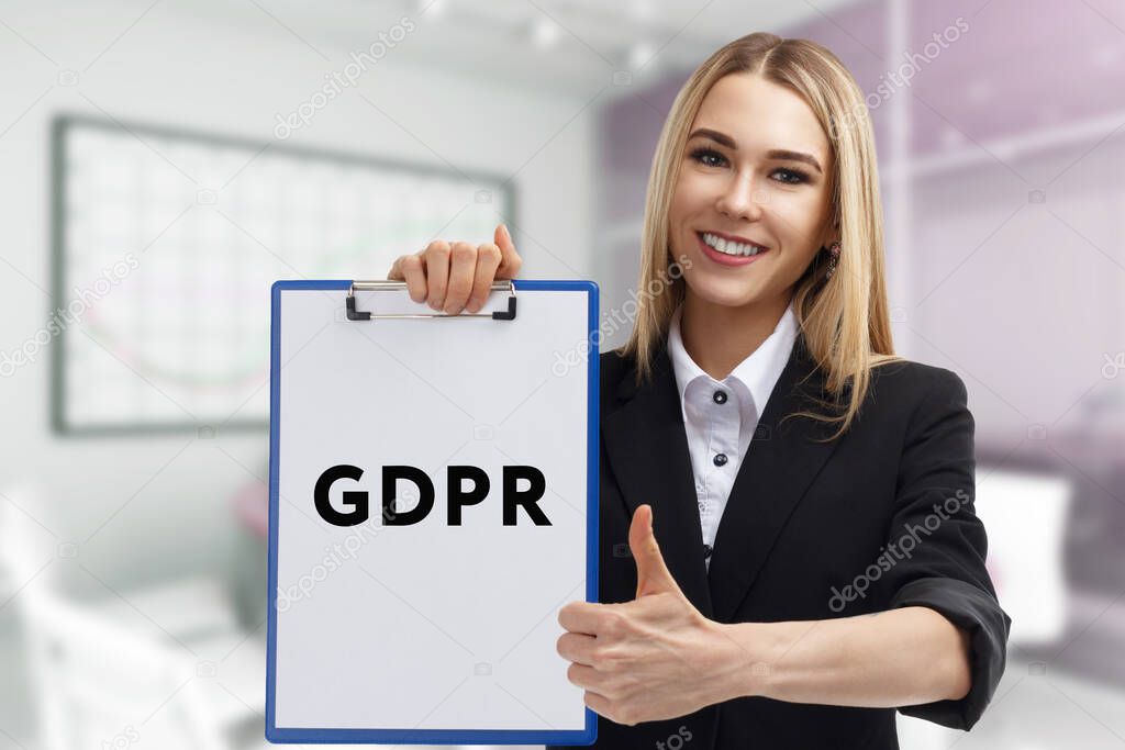Business, technology, internet and network concept. Young businessman thinks over the steps for successful growth: GDPR