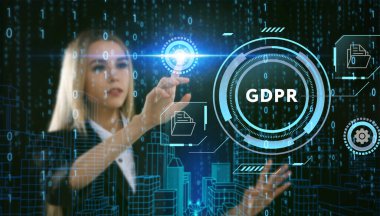 İş, Teknoloji, İnternet ve ağ konsepti. Genç işadamı geleceğin sanal ekranı üzerinde çalışıyor ve GDPR yazısını görüyor.