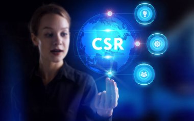 İş, Teknoloji, İnternet ve ağ konsepti. Genç işadamı geleceğin sanal ekranı üzerinde çalışıyor ve CSR yazısını görüyor.