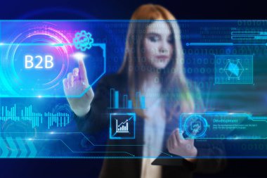 İş, Teknoloji, İnternet ve ağ konsepti. Genç işadamı geleceğin sanal ekranı üzerinde çalışıyor ve B2B yazısını görüyor.
