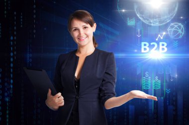 İş, Teknoloji, İnternet ve ağ konsepti. Genç işadamı geleceğin sanal ekranı üzerinde çalışıyor ve B2B yazısını görüyor.