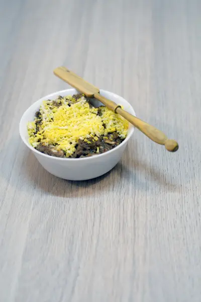 Chicken liver terrine in a bowl with a wooden spoonula — Stock Photo, Image