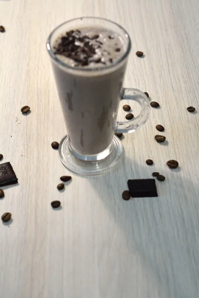 Glass of cold coffee cocktail with chocolate