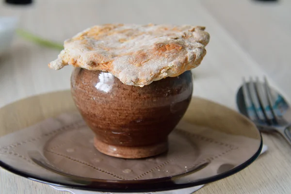 Pot pie served in a pot — Stok fotoğraf