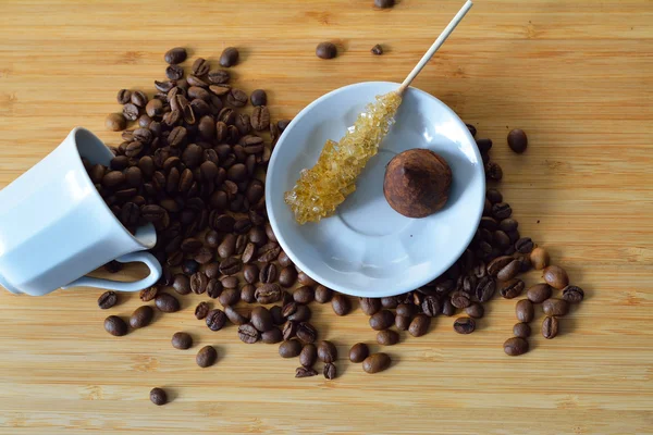 Truffle, sugar stick and coffee beans — Stock Photo, Image