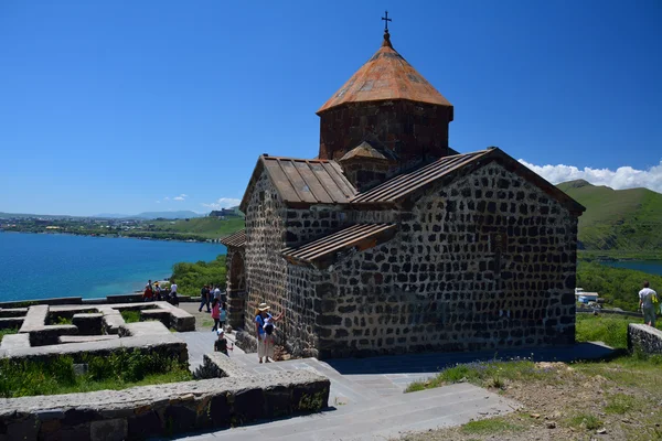 SEVAN, ARMENIA: 14.06.2014 - Sevanavank monastery with the touri — Stock Photo, Image