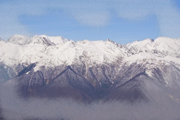 Сніг на горах і морозна рамка — стокове фото
