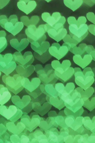 Πράσινο Χρώμα Καρδιές Bokeh Φόντο Κάθετη — Φωτογραφία Αρχείου