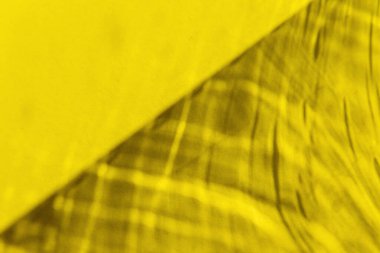 Yuvarlak gölgeli sarı arkaplan ve köşegen üzerinde parıltılar