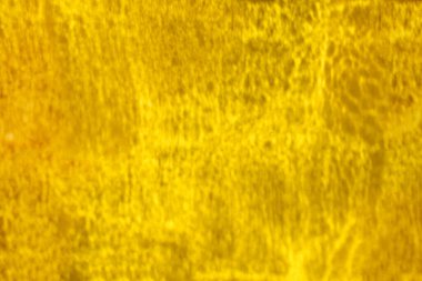 Sarı arkaplan, gölgeler ve ışıltılar 