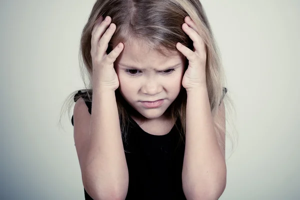 Portrait of sad blond little girl — Stock Photo, Image