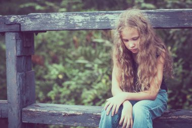 Portrait of sad blond teen 