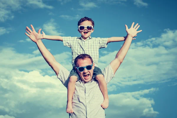 Father and son playing in the park  at the day time. — Stock Photo, Image