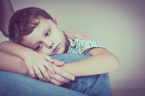 Sad son hugging his mother — Stock Photo, Image