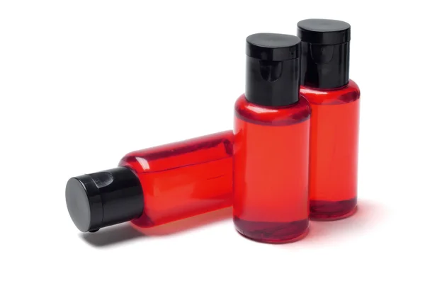 Três garrafas de produto cosmético — Fotografia de Stock