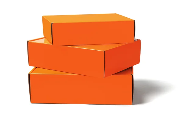 Drei orangefarbene Boxen — Stockfoto