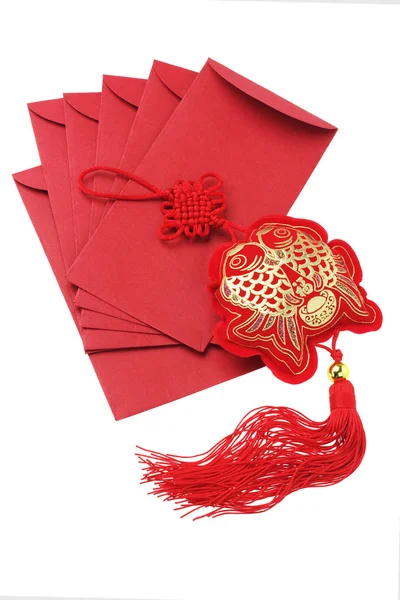 Auspicious Fish Ornament And Red Packets Royalty Free Stock Photos