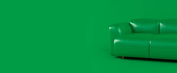 Yeşil deri kanepe, yeşil arka planda, gölgeli. Ahşap bacaklarda hakiki deriden yapılmış şık, modern bir kanepe. Yeşil renkli minimalist iç mekan. Tek parça mobilya. — Stok fotoğraf