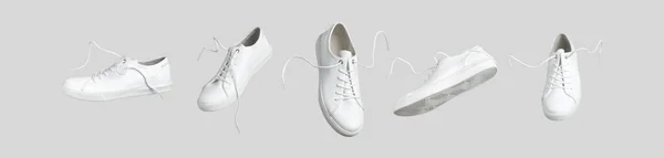 グレーの背景に隔離された白い革の女性のスニーカーを飛んで 異なる種類 ファッショナブルなスタイリッシュなスポーツカジュアルシューズ 履物と創造的なミニマルなレイアウト 靴屋の広告 Blog — ストック写真