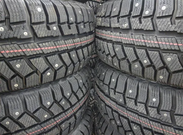 Winter studded tires for a car new close-up — Stock Photo, Image