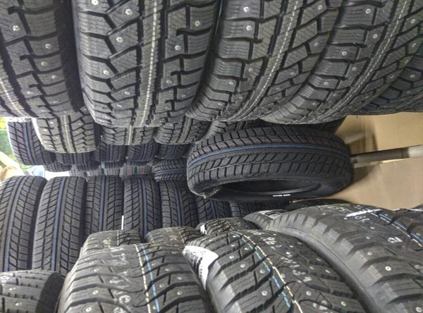 Winter studded tires for a car new close-up — Stock Photo, Image