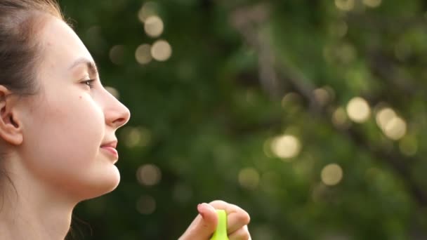 Footage woman blowing bubbles on nature. — Stock Video