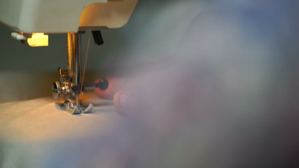 Footage of woman sews on the sewing machine. 4K — Stock Video