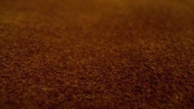 cow hide moving slowly over them in macro view