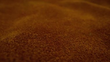 cow hide moving slowly over them in macro view