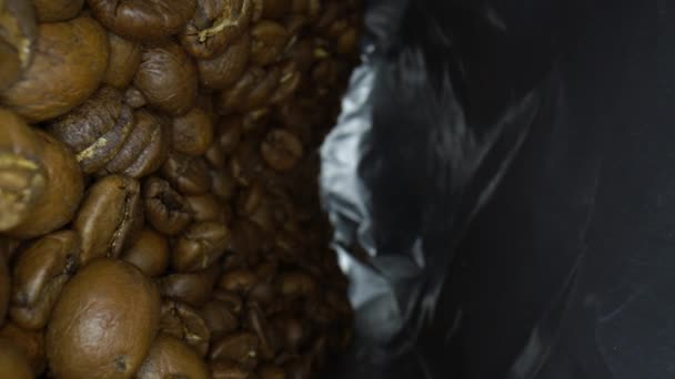 Macro video inside a packet of coffee beans. — Stock Video