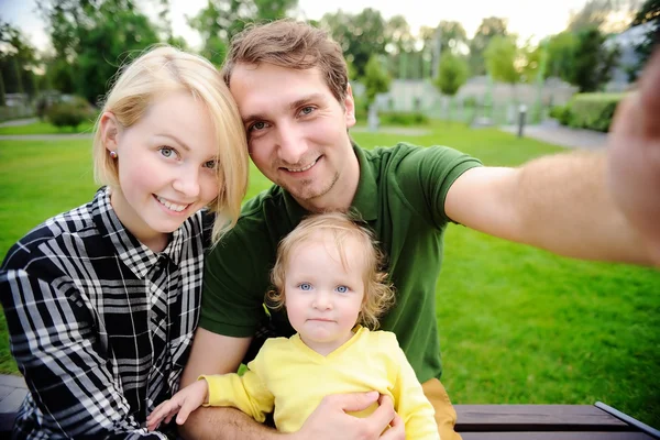 Happy family making selfie photo together — Stock Photo, Image