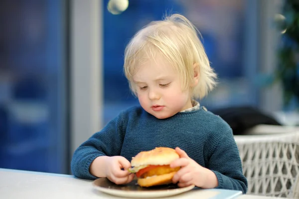 Cute Preschooler Boy Eating Large Hamburger Fast Food Restaurant Unhealthy — Stock Photo, Image