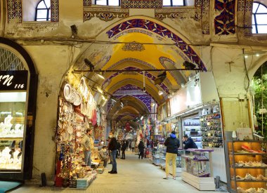 Istanbul, Turkey - March 5, 2021: Inside of Grand Bazaar. It is oldest shopping mall in history. There are thousand shops which sales jewelry,carpet, lamp, leather, ceramic, spices,seasoning and other