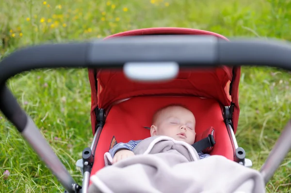 Baby sleeping in stroller — Stock Photo, Image