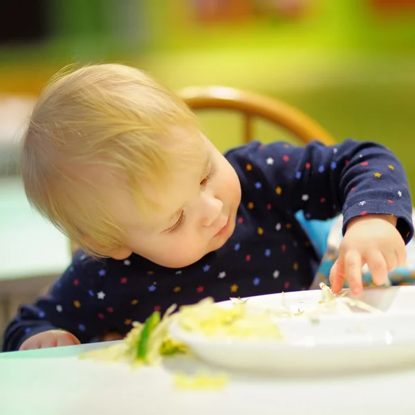 Toddler boy playing with food — Stock Photo, Image