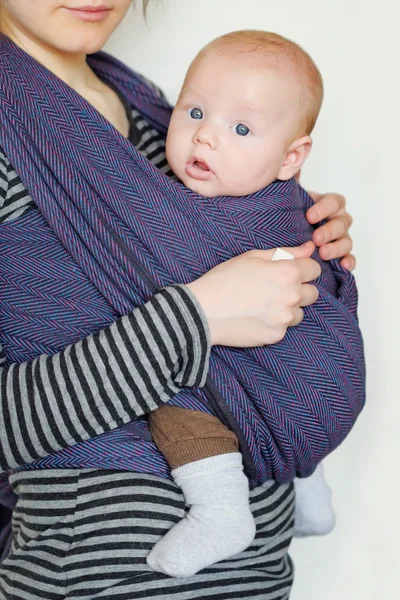 Baby in sling — Stock Photo, Image