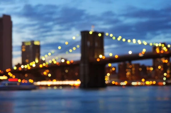 Bokeh photo of New York City Brooklyn Bridge at night — Stock Photo, Image