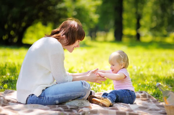 Young woman and her little son having fun — Stock Photo, Image