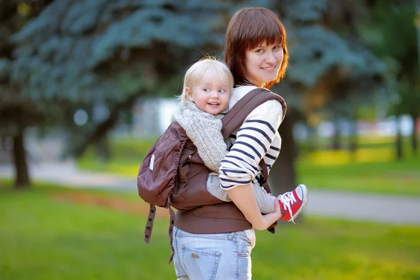 Young mother with her toddler child — Stock Photo, Image