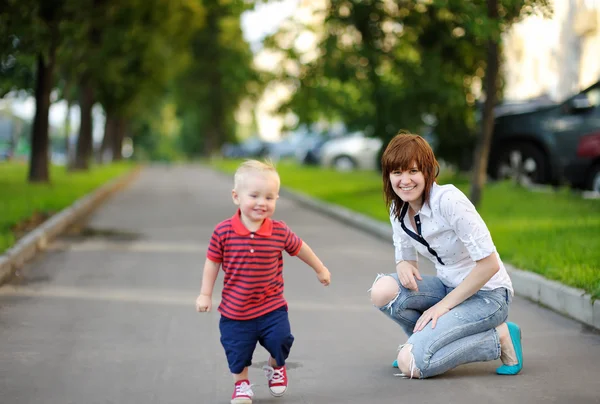 Young mother with her toddler son — Stock Photo, Image