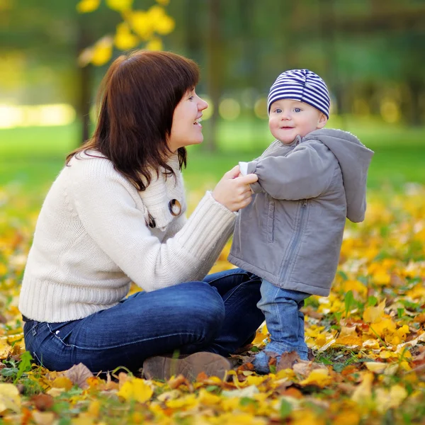 Young mother with her little baby having fun — Stock Photo, Image