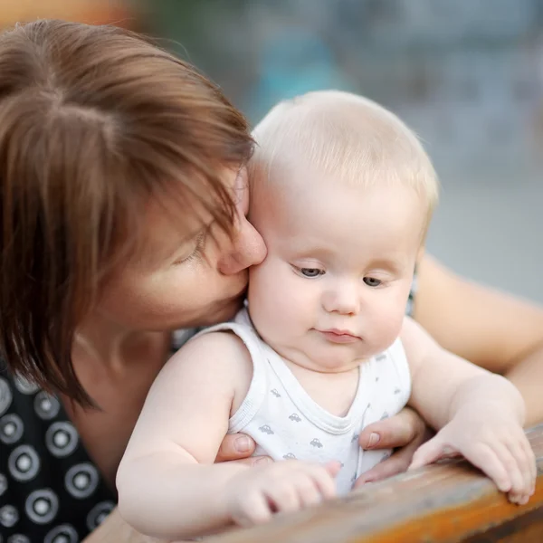 Beautiful middle aged woman and her adorable little grandson — Stock Photo, Image