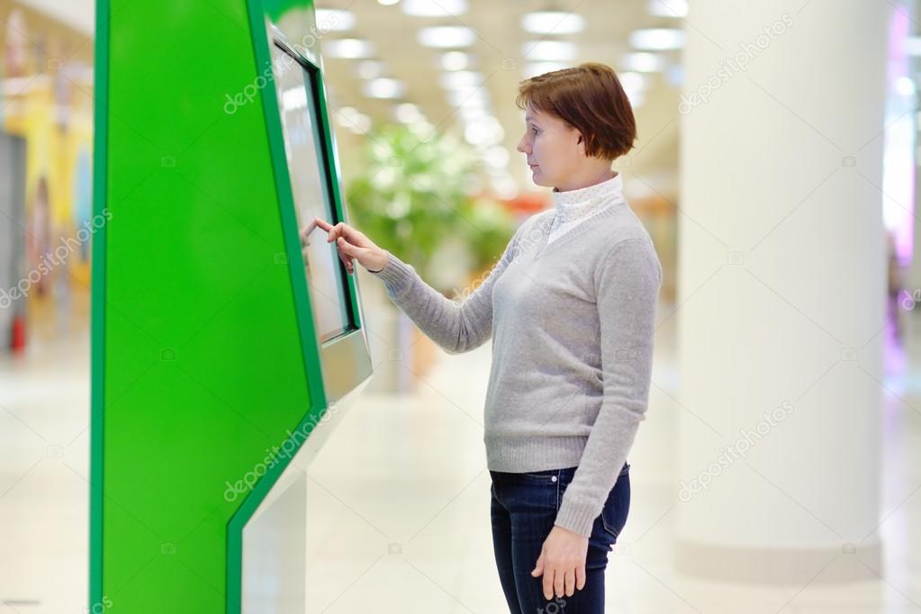 Woman in airport or shopping mall