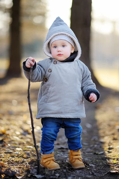 Toddler boy walking outdoors at the spring day — Stock Photo, Image