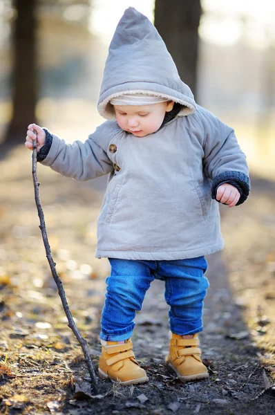 Toddler boy walking outdoors at the spring day — Stock Photo, Image