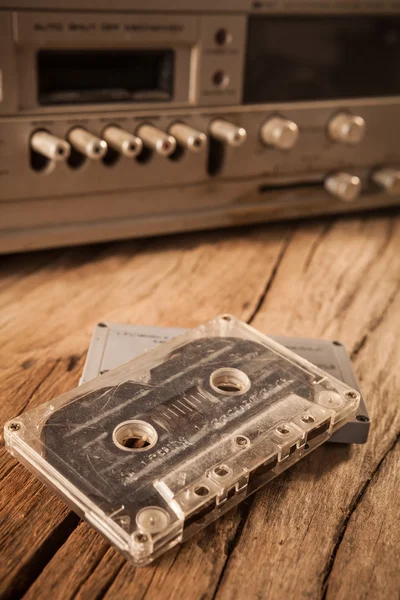 Old cassette tapes and cassette player — Stock Photo, Image
