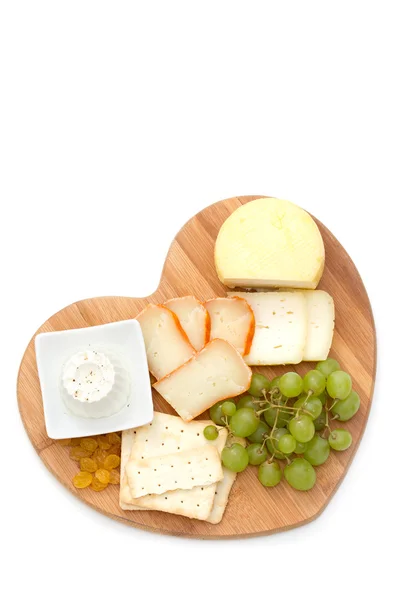 Cheese with cookies, grapes — Stock Photo, Image