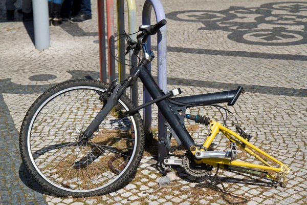 broken bicycle in the street