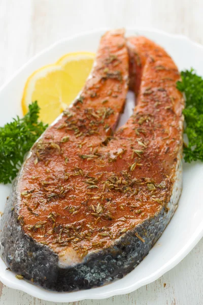 Fresh salmon with herbs and lemon — Stock Photo, Image