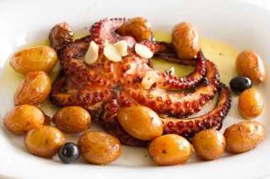 portuguese dish octopus with potato  clipart